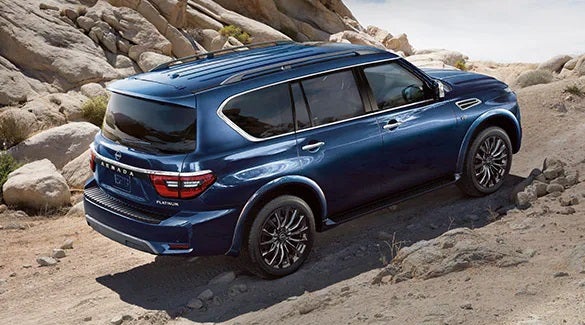 2023 Nissan Armada ascending off road hill illustrating body-on-frame construction. | Wallace Nissan in Stuart FL