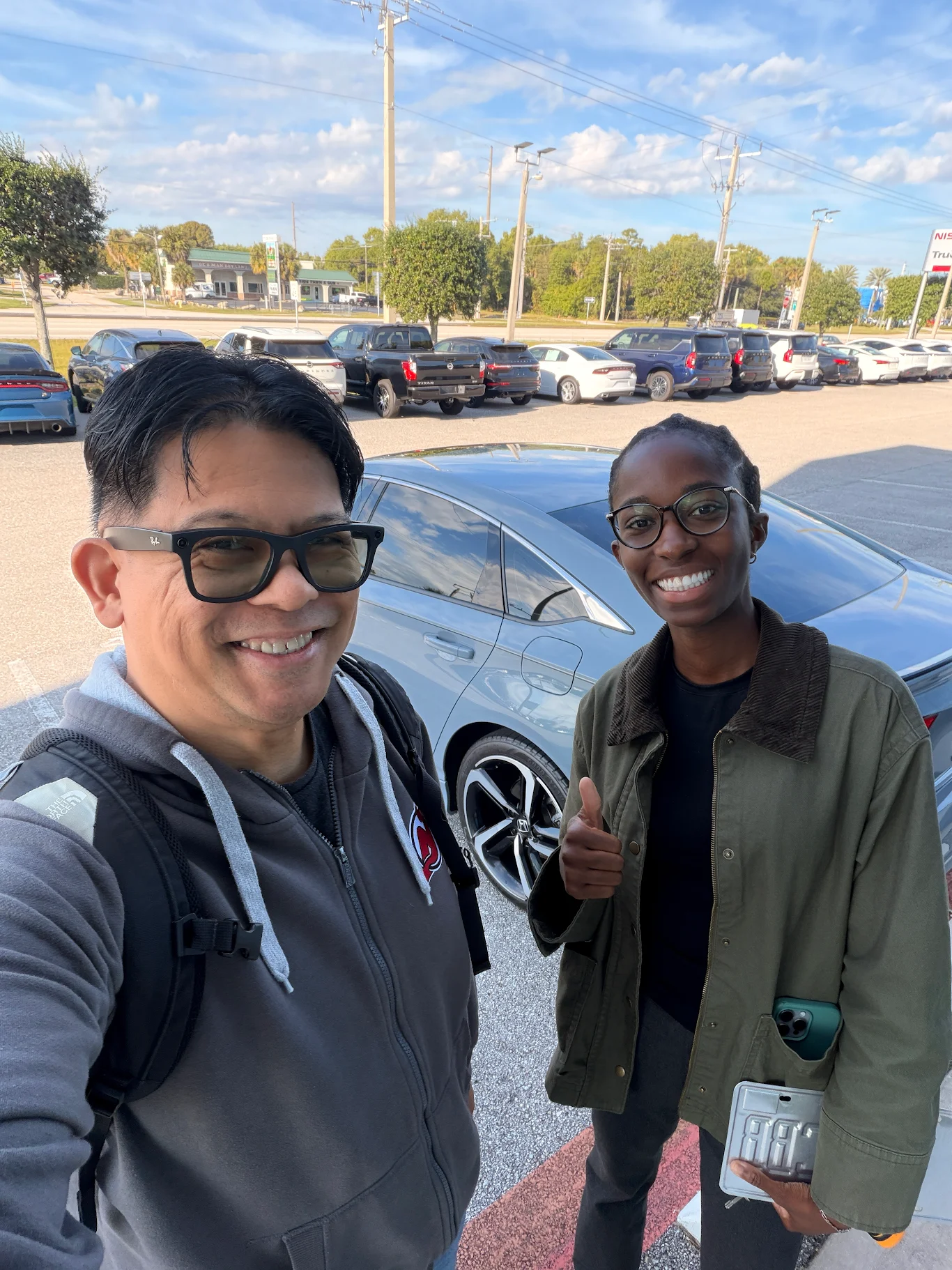 Thalia Profitt with happy customer